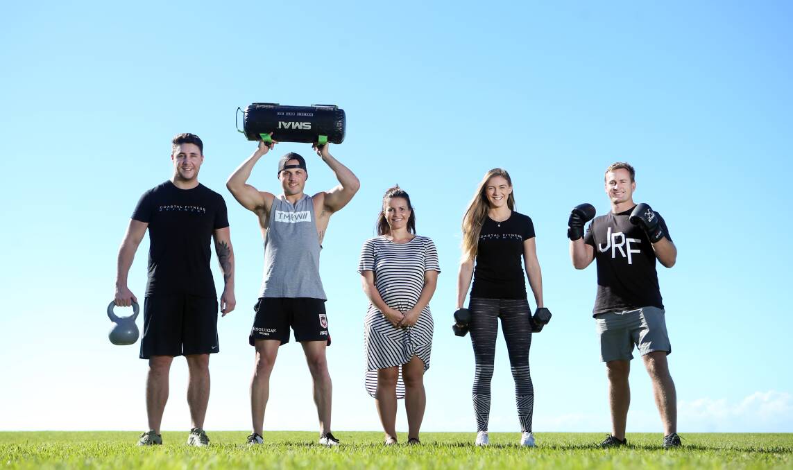 FIT TEAM: Healthy Livin director Courtney Beaton (middle) is working on expanding the festival in the future to spread wellness to other cities. AJ Hatch, Tom Baker, Courtney Beaton, Alyssa Warren and Joel Roberts are some of the wellness warriors set for the Kiama festival in March. Picture: Sylvia Liber