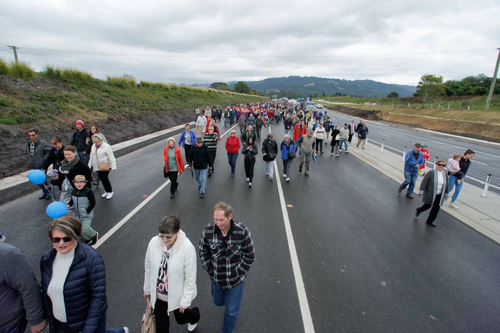 People walking along the Berry bypass ahead of its official opening. The new four-lane road has made a difference to holiday traffic in the town. Picture: Adam McLean
