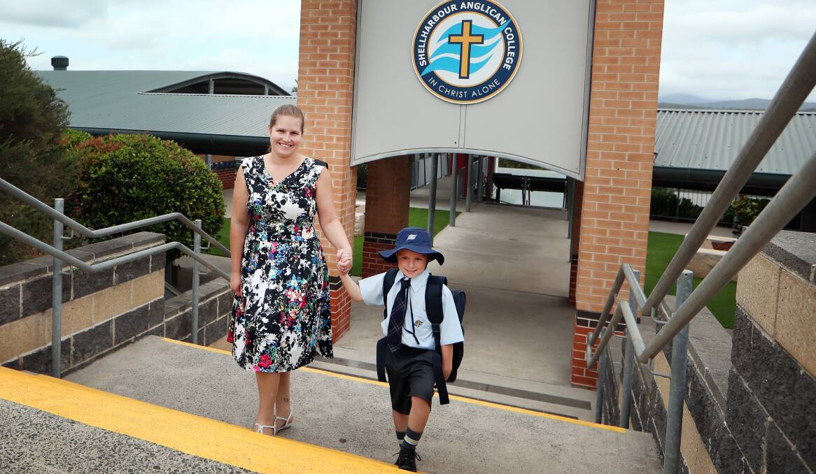 MAKING HISTORY: Melissa Ryan-Morris with her son Kayden Ryan-Morris at Shellharbour Anglican College. Picture: Sylvia Liber.