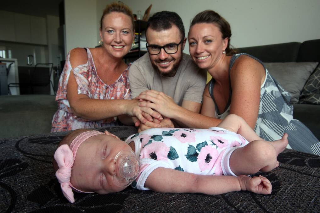 Bundle of joy: Mia Wingrove has helped brother-in-law Ben Greaves and sister Tisha Greaves realise their dream of becoming parents by carrying their daughter Indi to term. Picture: Robert Peet