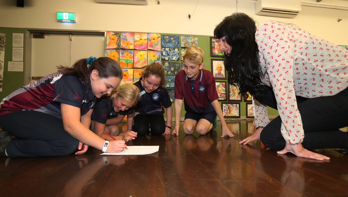 CREATING MUSIC: Gerringong Public School students Karly Barrett, Madi Anderson, Lily Conkey and Riley Dwyer with Shelley Harland. Picture: Robert Peet.