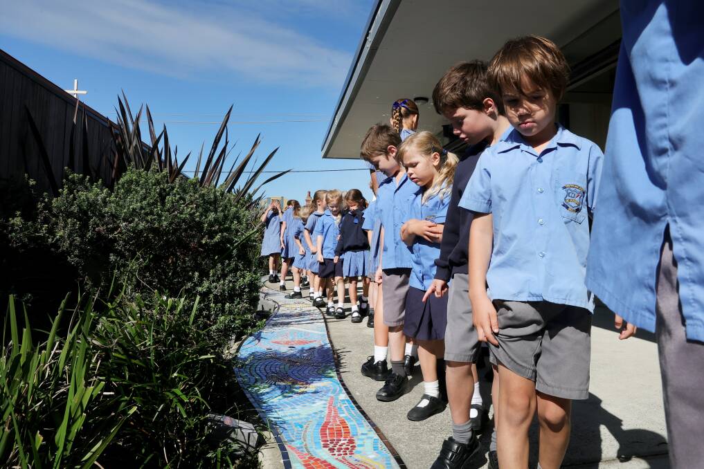 St Joseph's Catholic Primary School students take a look at the new Cosmic Walk mosaic. Picture by Sylvia Liber