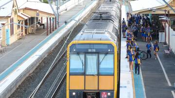 Students and other commuters at Bulli Station. Picture by Adam McLean