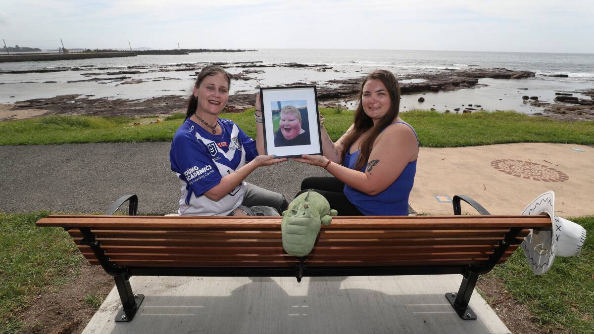 Ryley Henry's mother Kirsty Wilson, left, and her close friend Jessica Warren sit on the bench newly installed in the 13-year-old's honour. Picture by Robert Peet