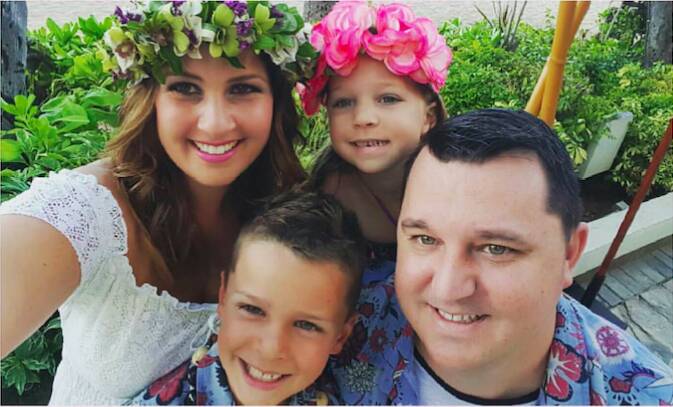 Loving family: Kylie and Adam Regal renewed their wedding vows in Hawaii last October, with children Ajai, 12, and Ciara, 8, by their sides. Mr Regal, 35, died last week after a five-year battle with MND. Picture: Supplied