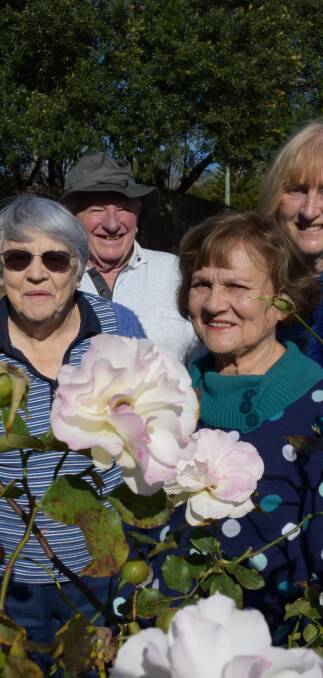 IN BLOOM: Thelma and Bob Harris with Ro Parker and Esmay Foster.