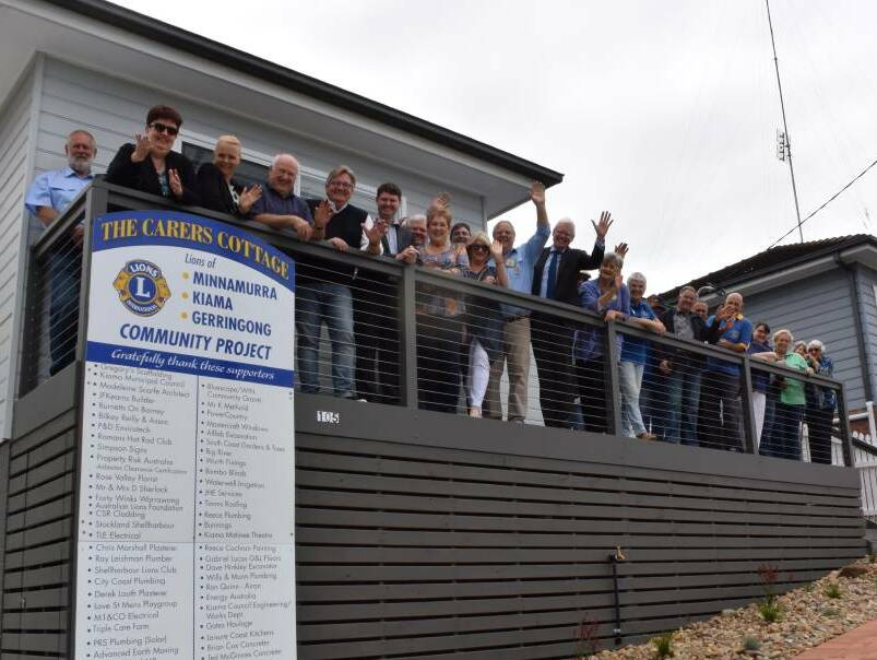 BIG GOALS: Kiama, Minnamurra and Gerringong Lions celebrate the completion of the carer's cottage in 2018.