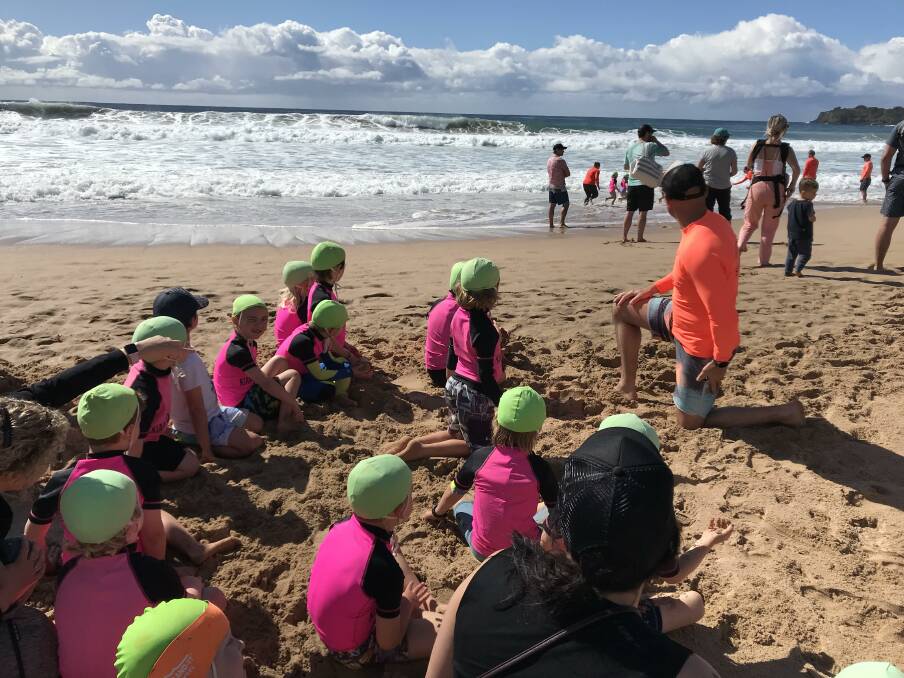 Under 6 Nippers learn to look out for hazards at the beach.
