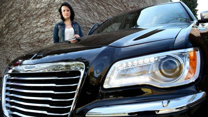 Camille Watson with her third Chrysler in two months after one caught fire and the second lost steering. Photo: Angela Wylie