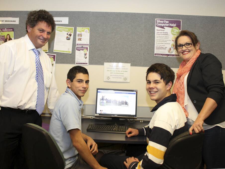 One of the current program sponsors Joe Dignam from First National Gerringong, students Mateo Gaytizolo and Aaron Matis, and tutor Francine Bishop during a session at the Kiama Community College last week. Picture: DAVID HALL