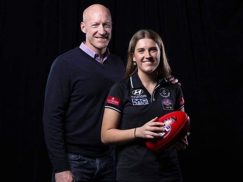 Abbie McKay with her father and former Blue Andrew McKay at the 2018 AFLW Draft.
