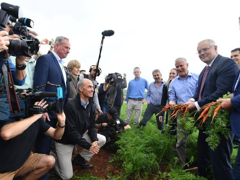 PM Scott Morrison has promised $100m for Tasmanian irrigation projects if he wins the election.
