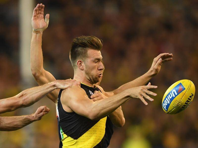 Richmond coach Damien Hardwick is banking on Noah Balta proving competitive with Hawthorn's ruckmen.