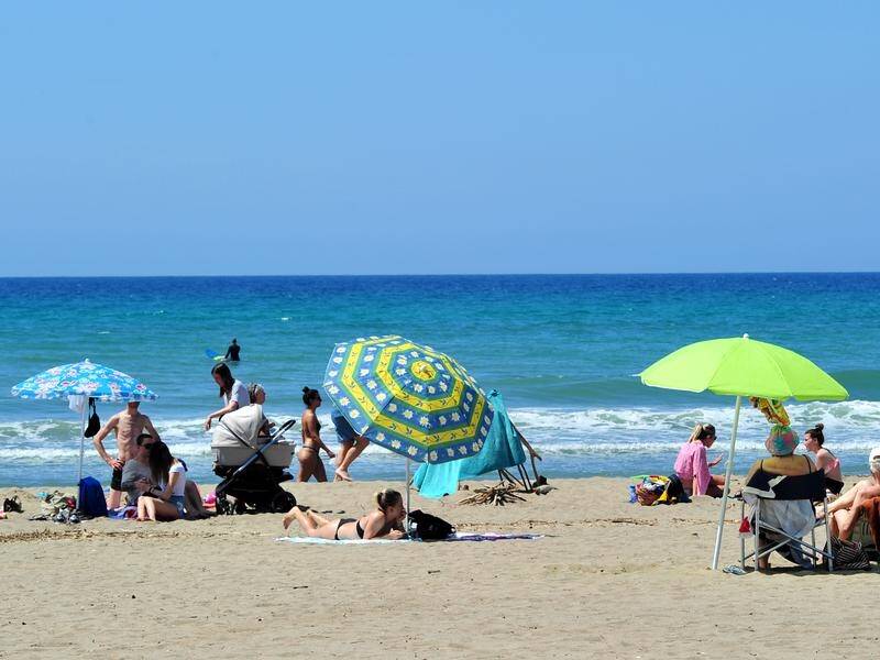 Italy's politicians have advised people to maintain health precautions as the weather warms up.
