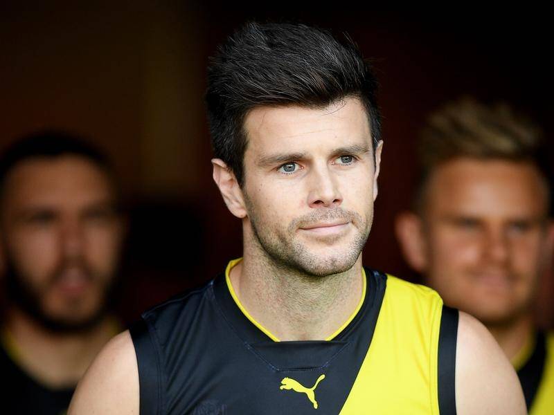 Richmond skipper Trent Cotchin remains on the AFL sideline with a hamstring injury.