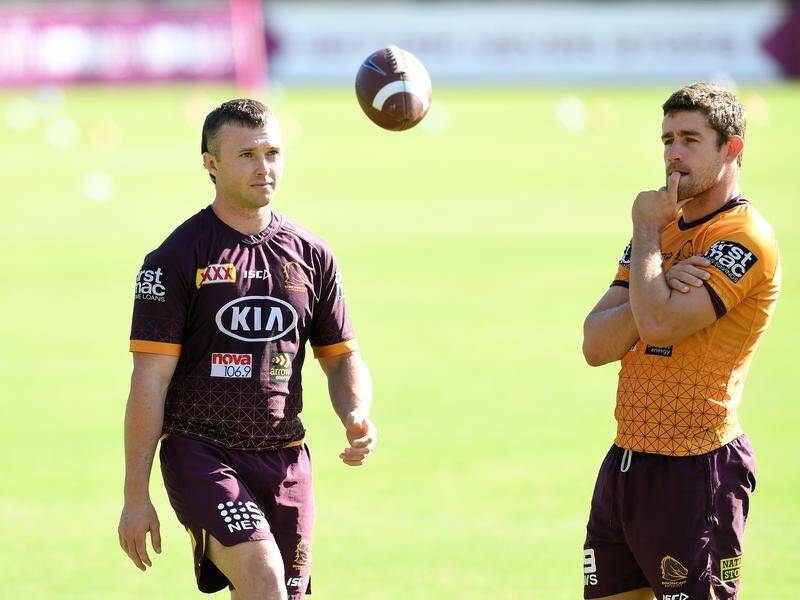 Andrew McCullough (r) has been released by Brisbane after losing the hooker role to Jake Turpin (l).