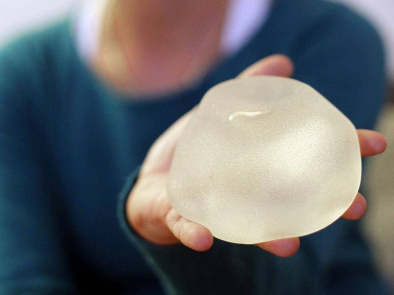 Cosmetic surgeons say there's "no cause for alarm" for people with textured breast implants.