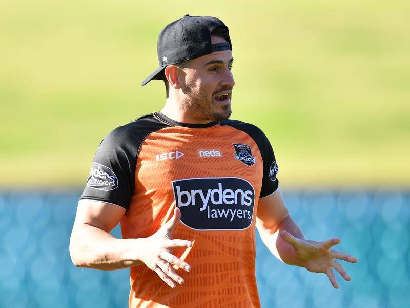 Wests Tigers' Josh Reynolds has been charged by police over an alleged domestic violence incident.