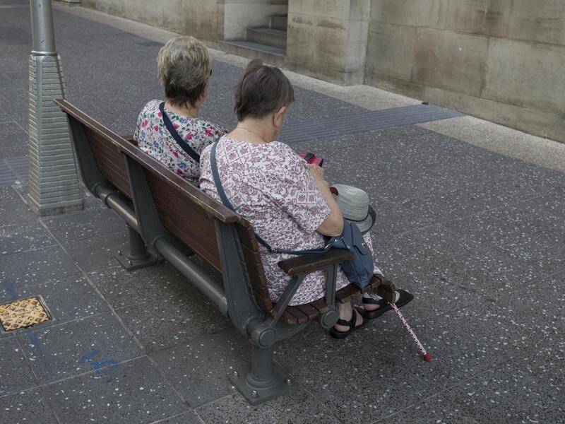 Queenslanders are beng urged to help the isolated elderly as coronavirus impacts daily life.