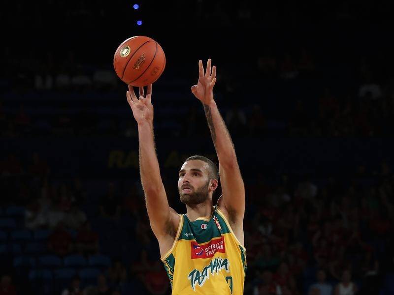 Jack McVeigh's late heroics sealed a thrilling win for Tasmania in game three of the NBL decider. (Richard Wainwright/AAP PHOTOS)