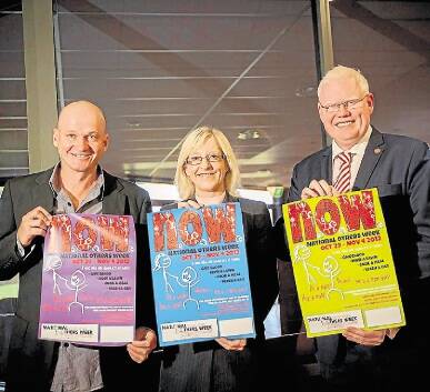 Shellharbour City Community Church Pastor Simon Cook, left, with Shellharbour councillor Kellie Marsh and Member for Kiama Gareth Ward promoting National Others Week.