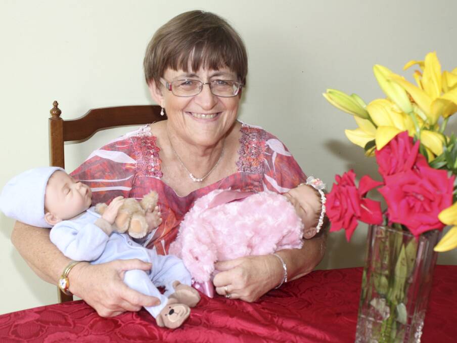 Having cared for more than 60 children during 15 years as a foster carer, Albion Park's Annette Holmes has been nominated in the Community Hero category as part of the 2014 NSW Woman of the Year Awards. Picture: DAVID HALL