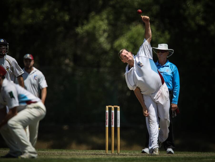 Warilla Kookas spinner Scott Cox is a study in concentration as he bowls during Saturday's hard-fought clash at Cavalier Park. Picture: DYLAN ROBINSON